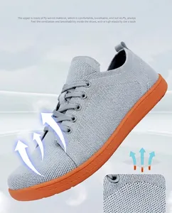 Detail showing fly-woven breathable upper and non-slip rubber sole of barefoot sports shoes