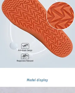 Detailed view of the shockproof rubber outsole with arrow-shaped non-slip patterns