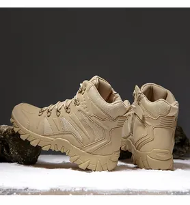 Detail view of khaki tactical boots with side zipper and rugged anti-slip rubber sole