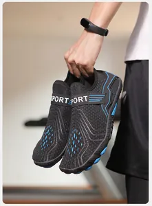 Detail of breathable large-hole mesh upper with blue gradient pattern and SPORT logo