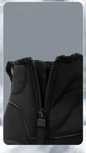 Detail of waterproof winter boot side zipper and warm faux fur lining for easy wearing