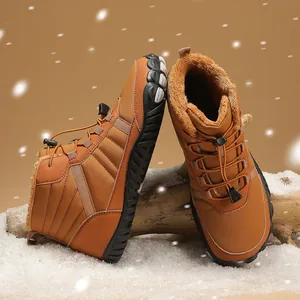 Detail of waterproof brown winter snow boots featuring warm plush lining and toggle laces