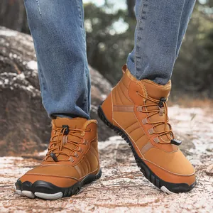Detail of waterproof snow boots showing soft faux fur lining and bungee lacing system