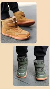 Detail of kids winter snow boots with warm faux fur lining and anti-slip rubber soles
