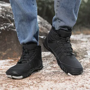 Detail of waterproof snow boot with warm fleece lining and elastic bungee lacing system