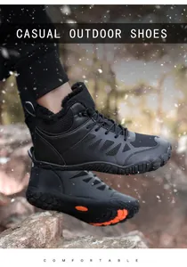 Detail of warm black winter outdoor boots with thick faux fur lining and non-slip rubber soles