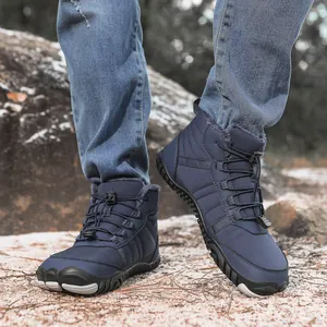 Close-up of waterproof dark blue snow boots with warm fleece lining and elastic laces