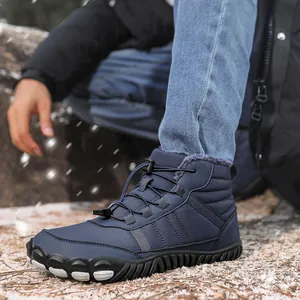 Detail view of waterproof high-top winter snow boots with warm faux fur lining and non-slip sole