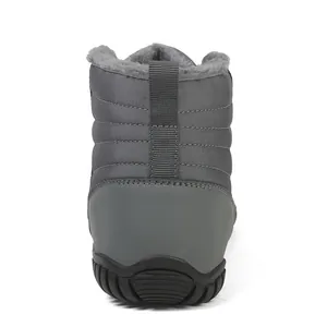 Rear view of waterproof winter snow boots with warm plush lining and grey quilted fabric