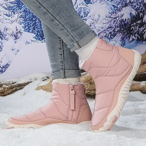 Waterproof pink winter snow boots for women with warm fur lining and non-slip soles