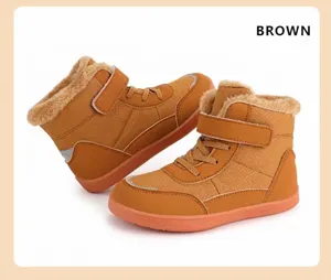 Detailed side view of brown winter snow boots for children with plush lining and velcro strap