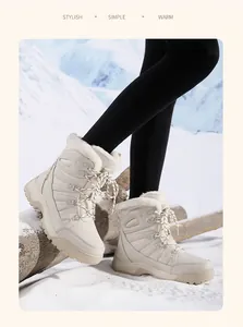 Detail of warm plush lining and sturdy cross-lacing on stylish outdoor snow boots