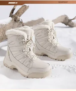 Detailed view of beige winter snow boots featuring plush lining and anti-slip rubber soles