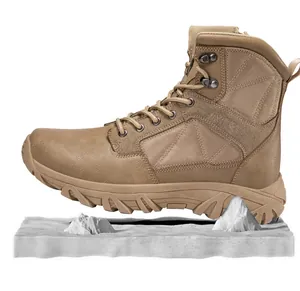 Detailed side view of high-top tactical boots on white mountain-like props for hiking