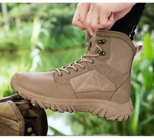 Close-up of durable tactical boot with khaki synthetic leather and non-slip rubber sole