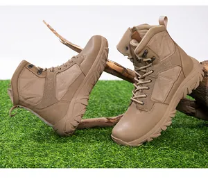 Close-up of khaki tactical boots showing durable leather texture and anti-slip rubber sole