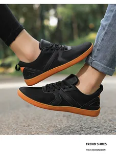 Outdoor shot of men's barefoot sneakers featuring wide toe box and non-slip gum sole