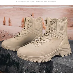 Detailed view of khaki tactical combat boots with durable non-slip soles on desert rocks
