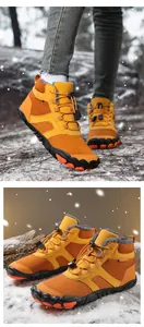 Detail of winter boots showing thick gray faux fur lining and anti-slip rubber outsole