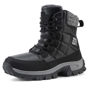 Winter snow boots in black quilted finish with thick gray faux fur lining for warmth