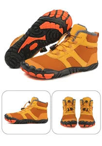 Detail of warm faux fur lining and anti-slip rubber grip sole on winter outdoor snow boots
