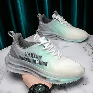 Zapatillas de running para hombre con malla en degradado verde menta y cámara de aire