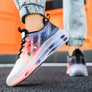 Zapatillas de running para hombre con degradado naranja y violeta y suela de aire