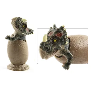 Detailed hatching Triceratops dinosaur egg model with realistic skin texture on white base