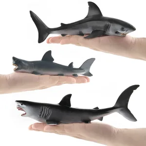 Realistic solid PVC great white shark ocean animal models held in hand for size