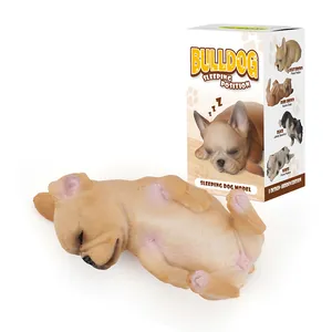 Figurine miniature réaliste de bouledogue français endormi avec son emballage de vente