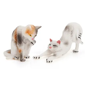 Solid PVC realistic cat figurines set featuring calico and grey spotted kittens