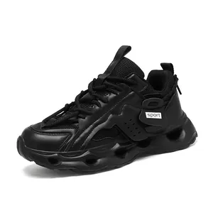 Women's chunky black platform sneakers with breathable mesh and sport label