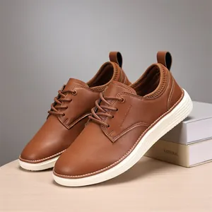 Detail view of brown oxford shoe with thick white sole and non-slip texture