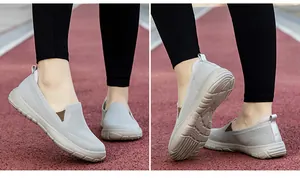 Primer plano de zapatos grises con empeine de malla transpirable y suela de goma antideslizante