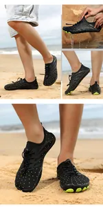 Close-up of quick-dry water shoes with anti-slip rubber sole and yellow dot pattern