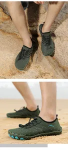 Detail of green quick-dry water shoes with anti-slip rubber sole and bungee laces