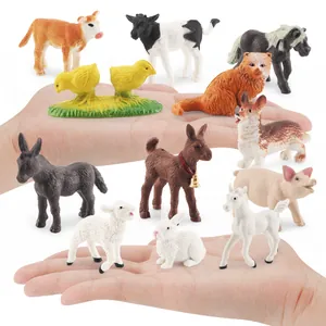 12-piece realistic farm animal figurines set in palm to show miniature scale
