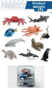 Detail view of 10-piece ocean animal toy set weighing 73g on a digital scale