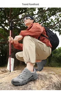 Close-up of durable grey hiking shoes with breathable mesh and anti-slip rubber outsoles