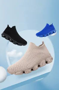 Close-up of lightweight breathable mesh sneakers in black, blue and beige colors