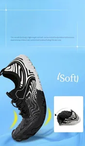 Flexible zebra print water shoes showing superior sole flexibility and elastic laces