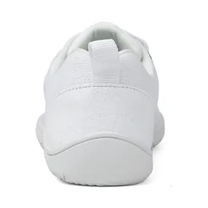 Rear view of white toddler shoes featuring mesh fabric and synthetic suede heel details