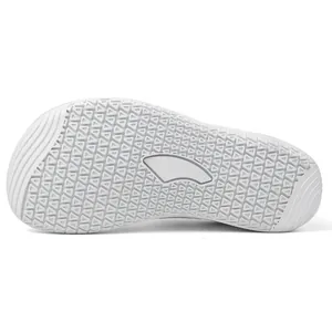 Close-up of flexible soft sole with anti-slip triangle patterns and streamlined design