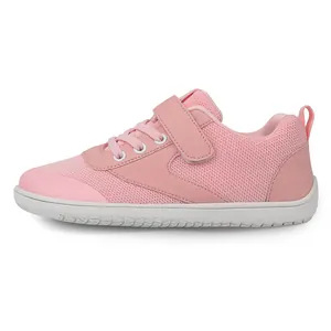 Detail of pink toddler wide-toe walking shoes with breathable mesh and velcro closure