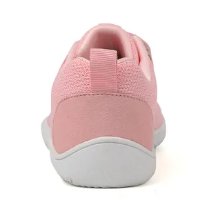 Detailed back view of pink toddler shoes with mesh fabric and anti-slip white rubber sole