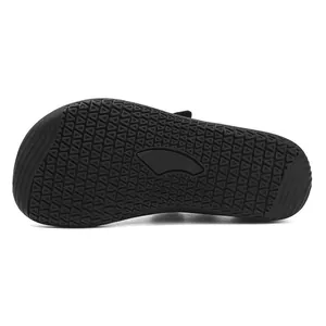 Macro shot of non-slip rubber sole with triangular patterns for kids outdoor shoes