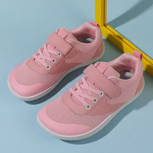 Pink breathable mesh kids sneakers with velcro strap and flexible white rubber sole