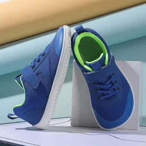 Detail of toddler wide-toe walking shoes with breathable blue mesh and secure velcro strap