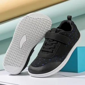 Detail of baby walking shoes showing anti-slip rubber sole and breathable mesh texture