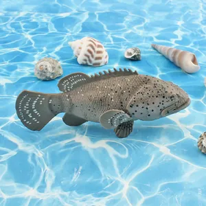 Realistic grouper fish animal model figurine for educational display on ocean background
